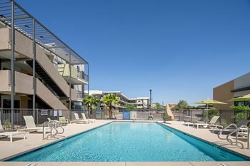 Swimming pool with built-in bench seating
